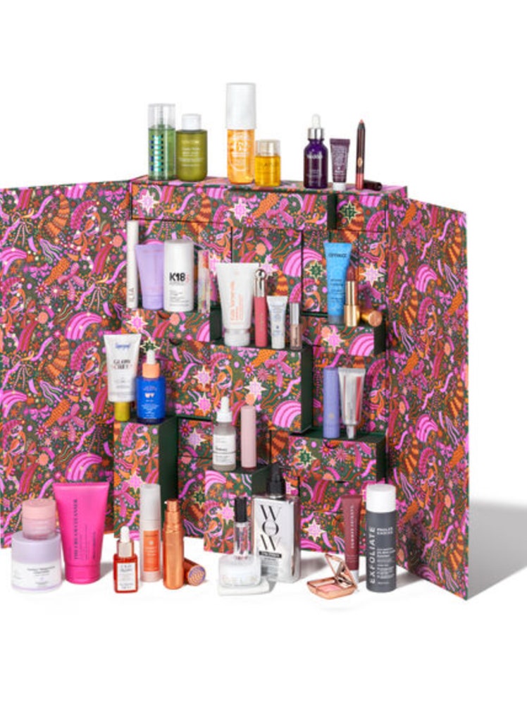 Image may contain Cosmetics Lipstick Candle Accessories Bag and Handbag