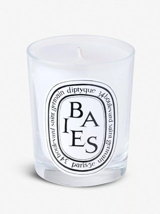 Image may contain Candle and Glass