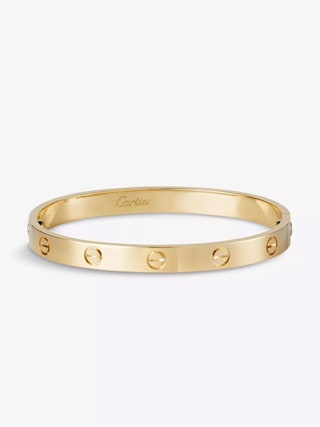 Image may contain Accessories Jewelry Ornament Bracelet Ring and Tape