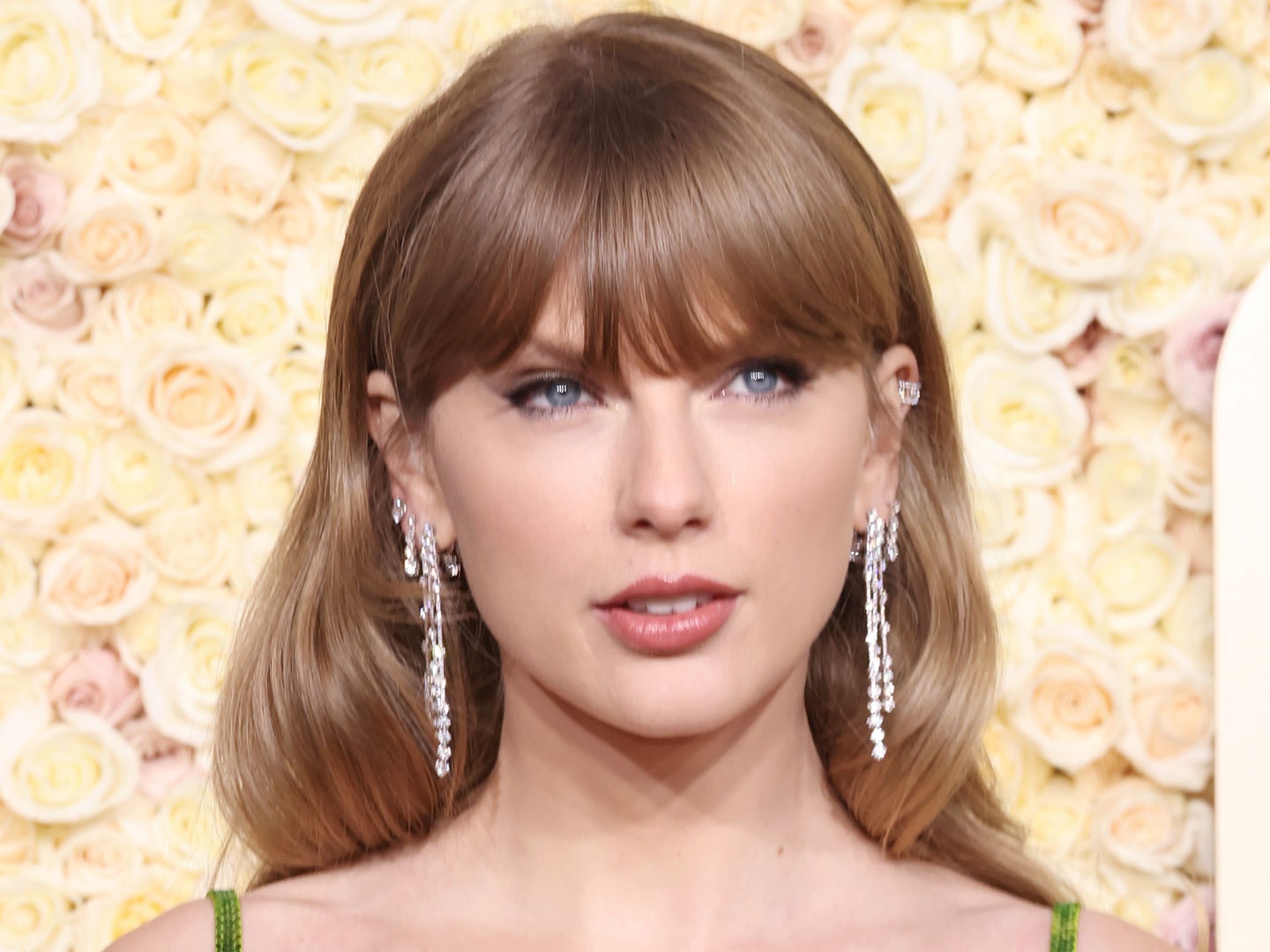Taylor Swift went full bombshell at the Chiefs game in a corset top and thigh-high boots